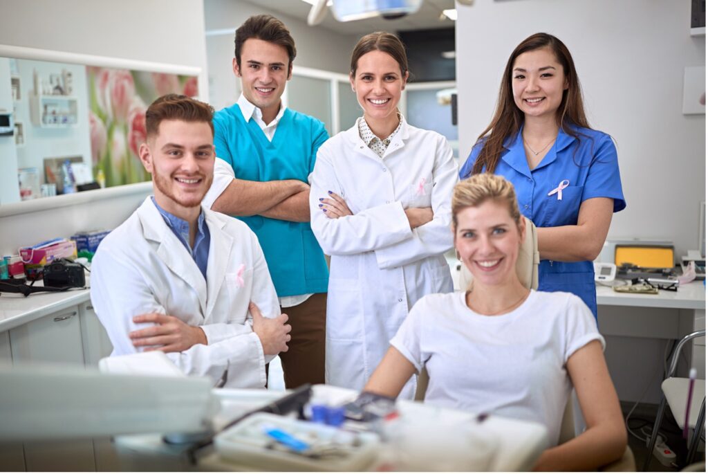 A group of people posing for a photo, 10 Essential Components of an Effective Personnel System