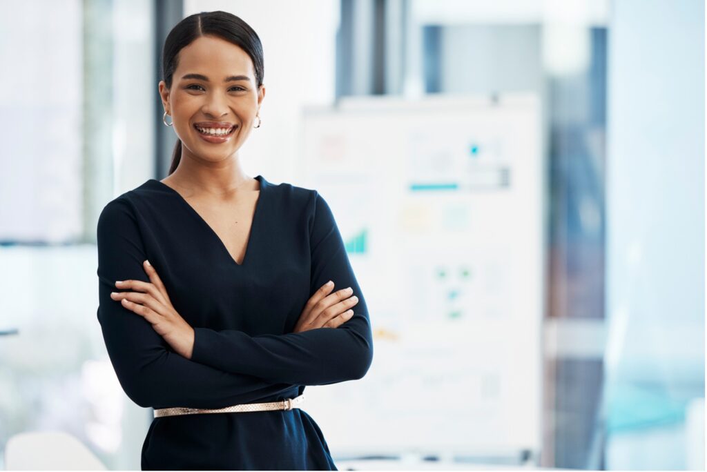 A person in a black dress with her arms crossed, Mastering Healthcare Practice Efficiency: The Power of an Effective Executive System